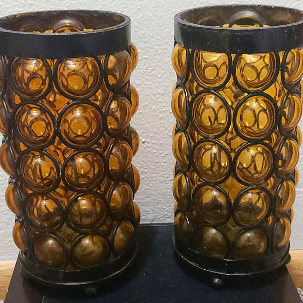 Set of two vintage Mexican caged amber glass sconc